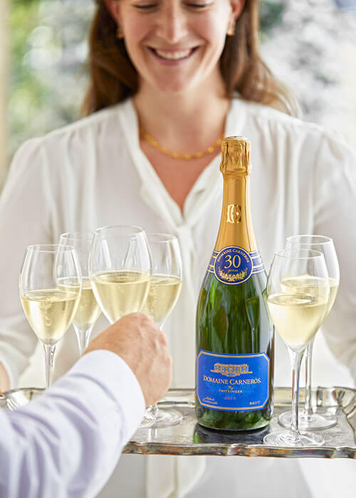 Serving Domaine Carneros sparkling wine