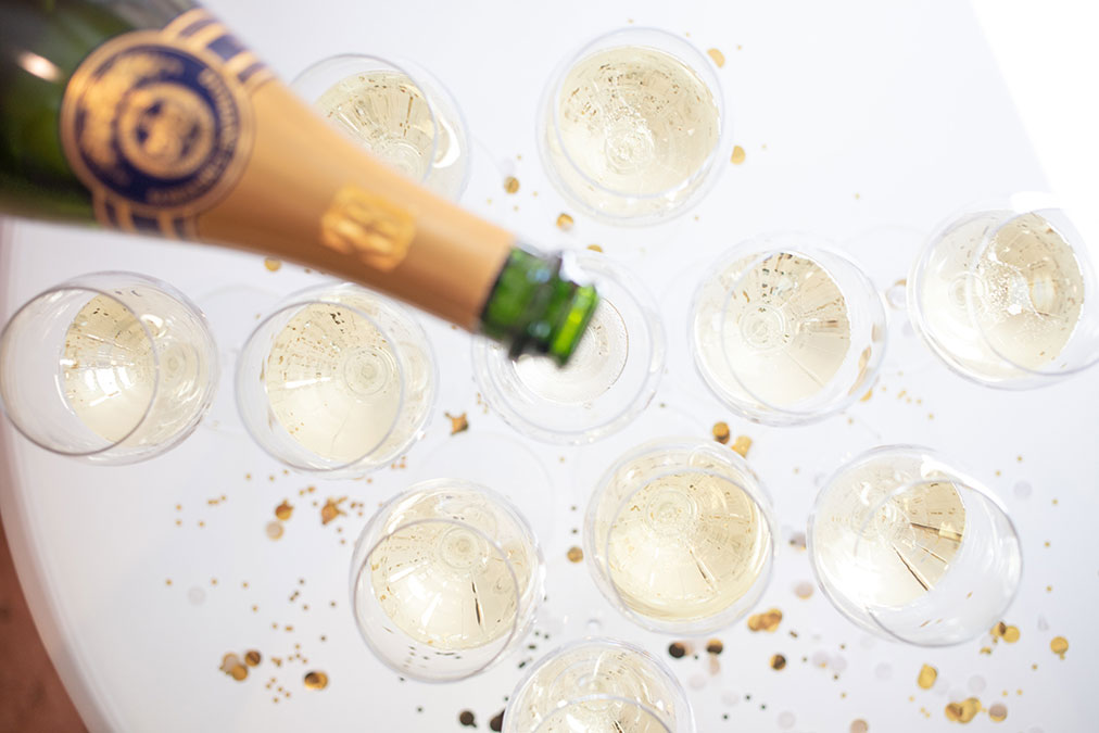 Pouring Domaine Carneros sparkling wine